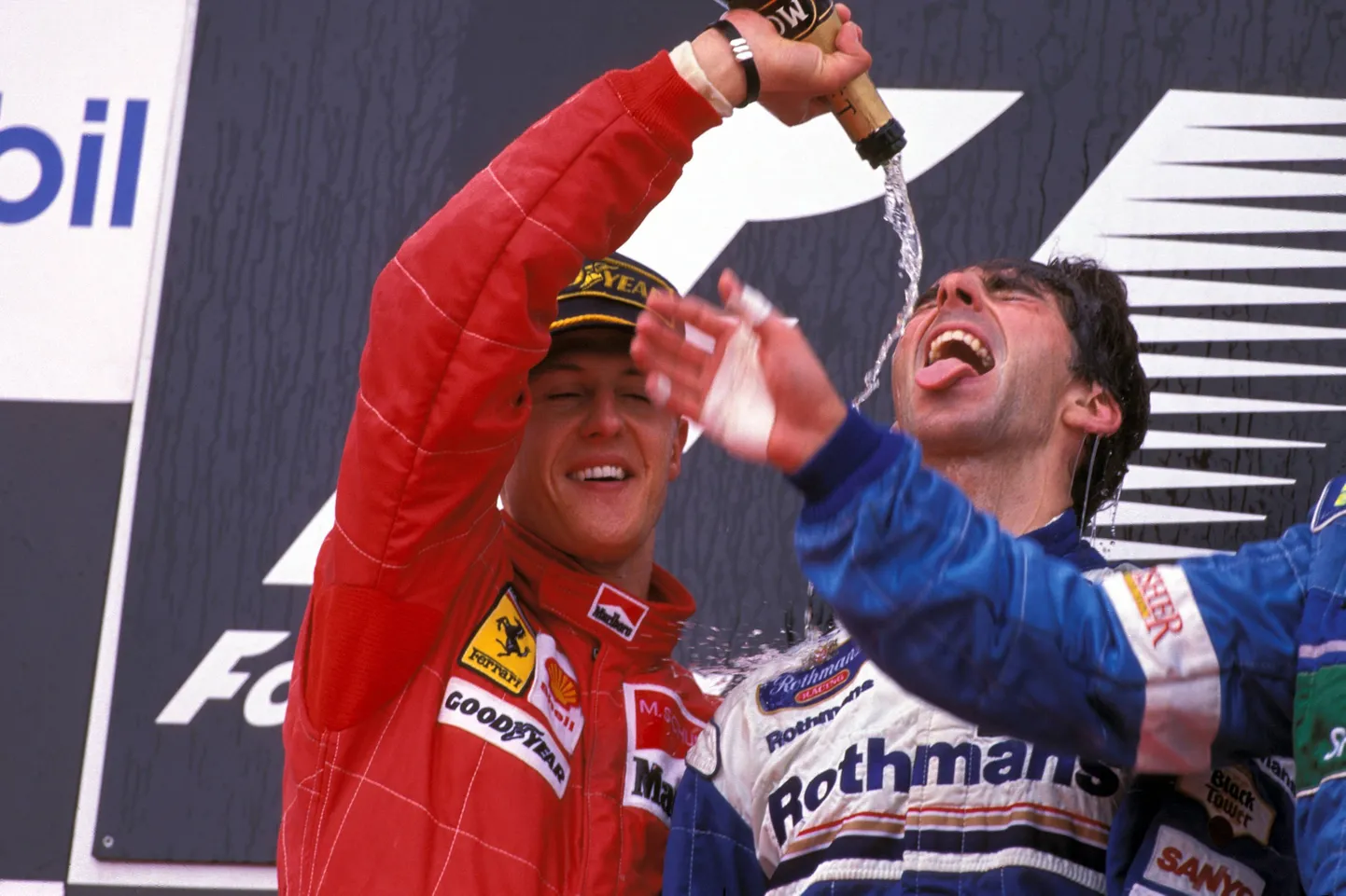 Michael Schumacher (vasakul) ja Damon Hill 1996. aastal.