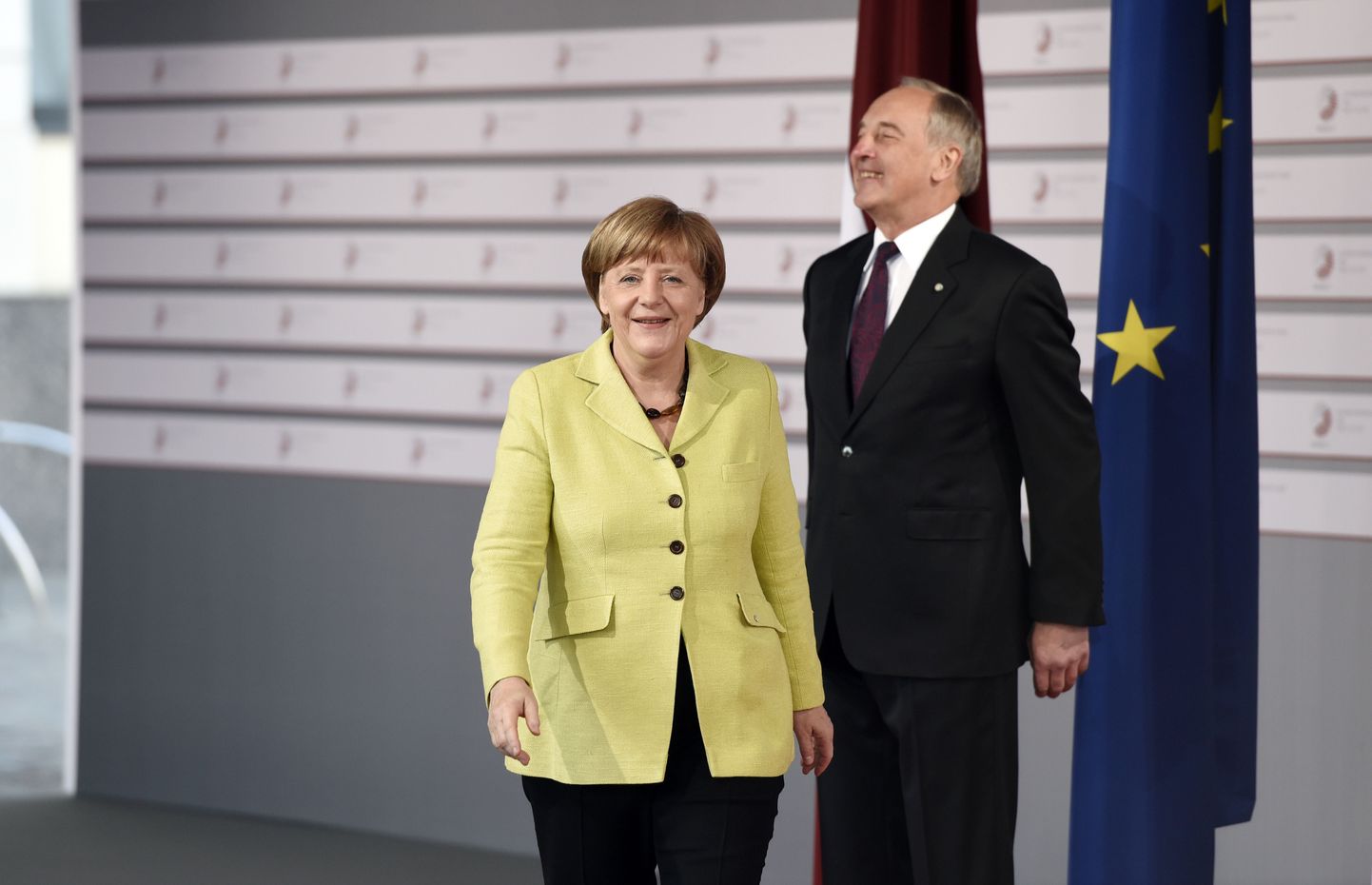Bērziņš koos Angela Merkeliga.