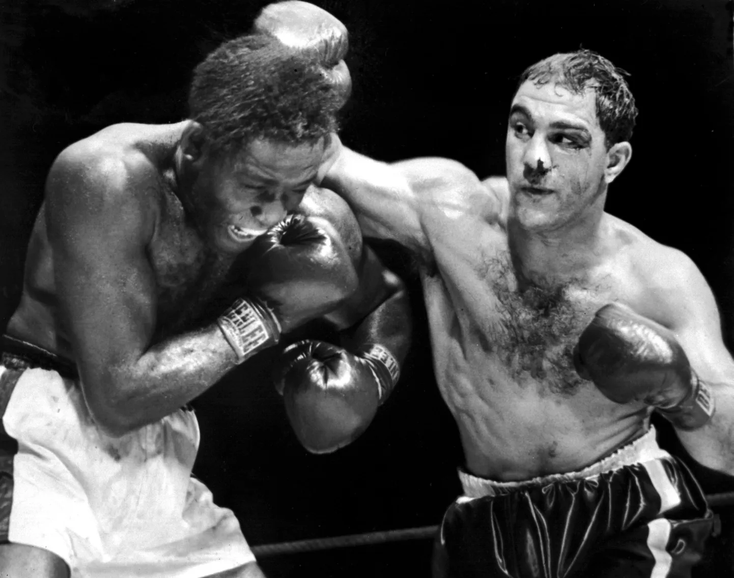 Rocky Marciano (paremal).