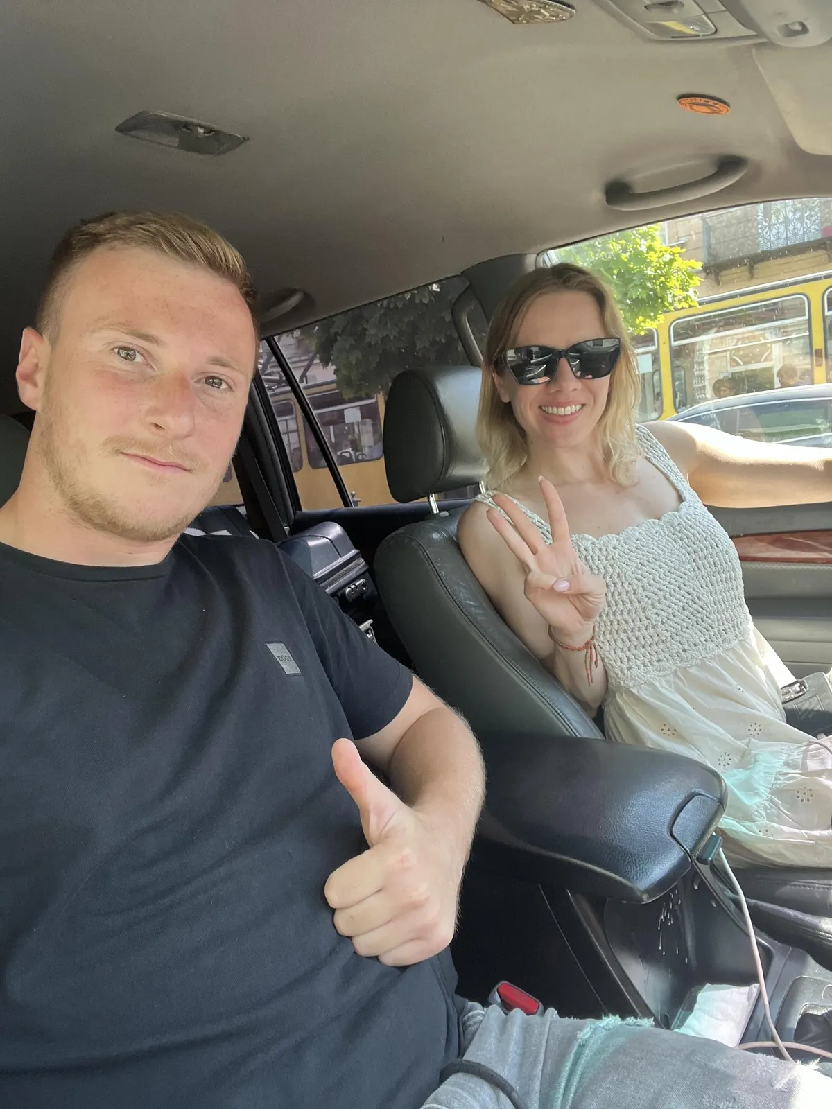 Estonian volunteer Torhalla-Maarja Metsniin with her friend Jordan Andrews, a British ski coach.