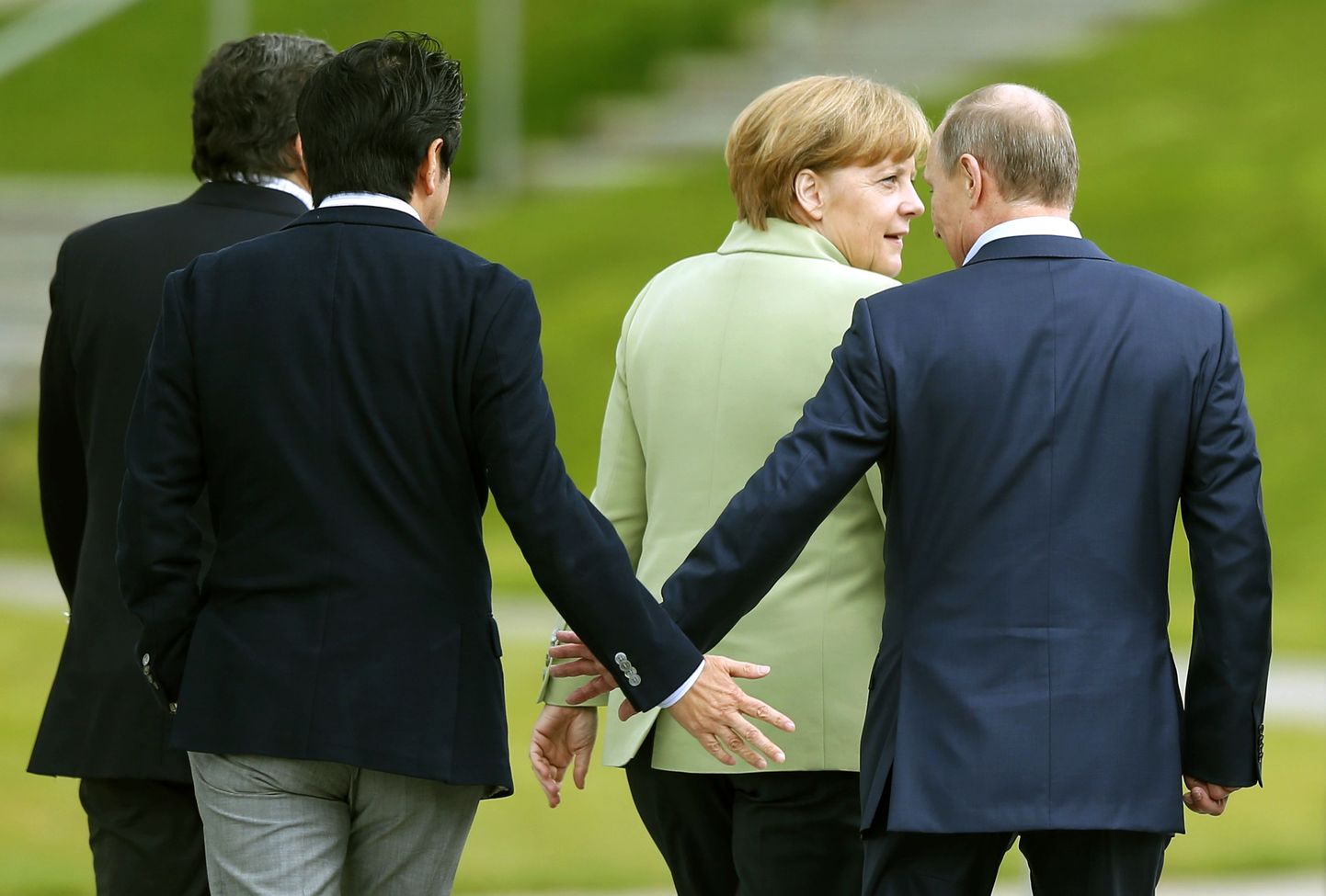 Jaapani peaminister Shinzo Abe, Venemaa president Vladimir Putin, saksamaa kantsler Angela Merkel
