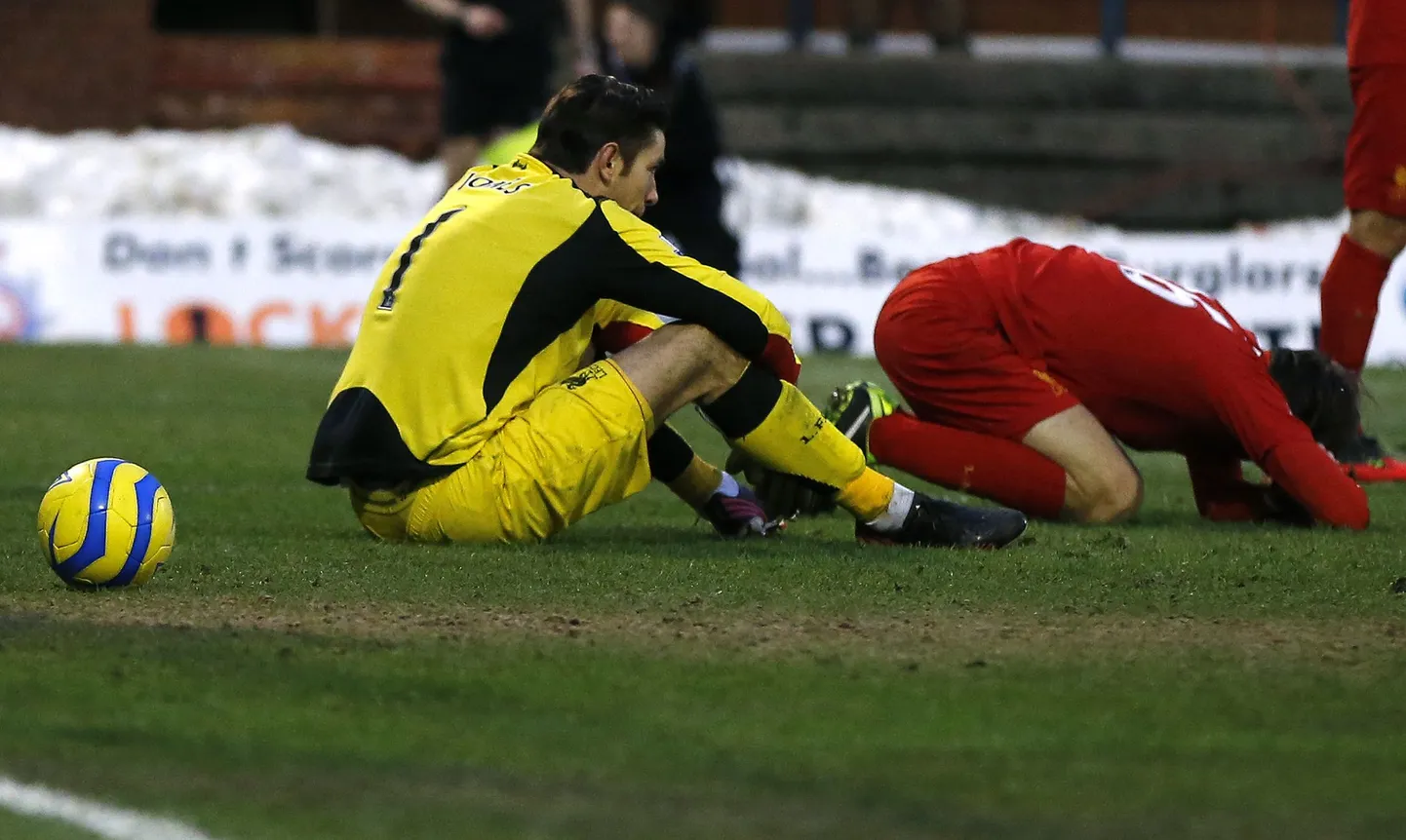 Pettunud Liverpooli mängijad Brad Jones (vasakul) ja Sebastian Coates.
