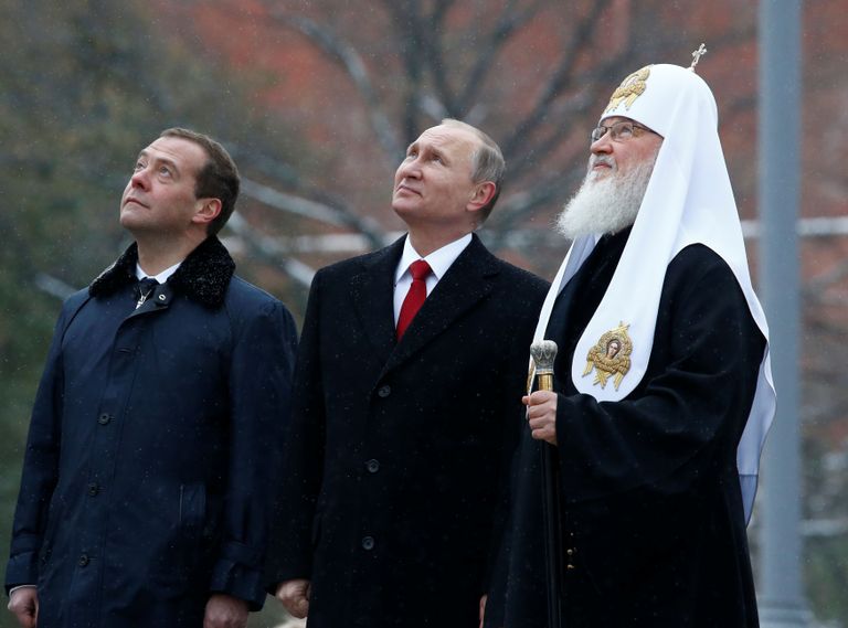 Venemaa peaminister Dmitri Medvedev, president Vladimir Putin ja patriarh Kirill. / Scanpix.