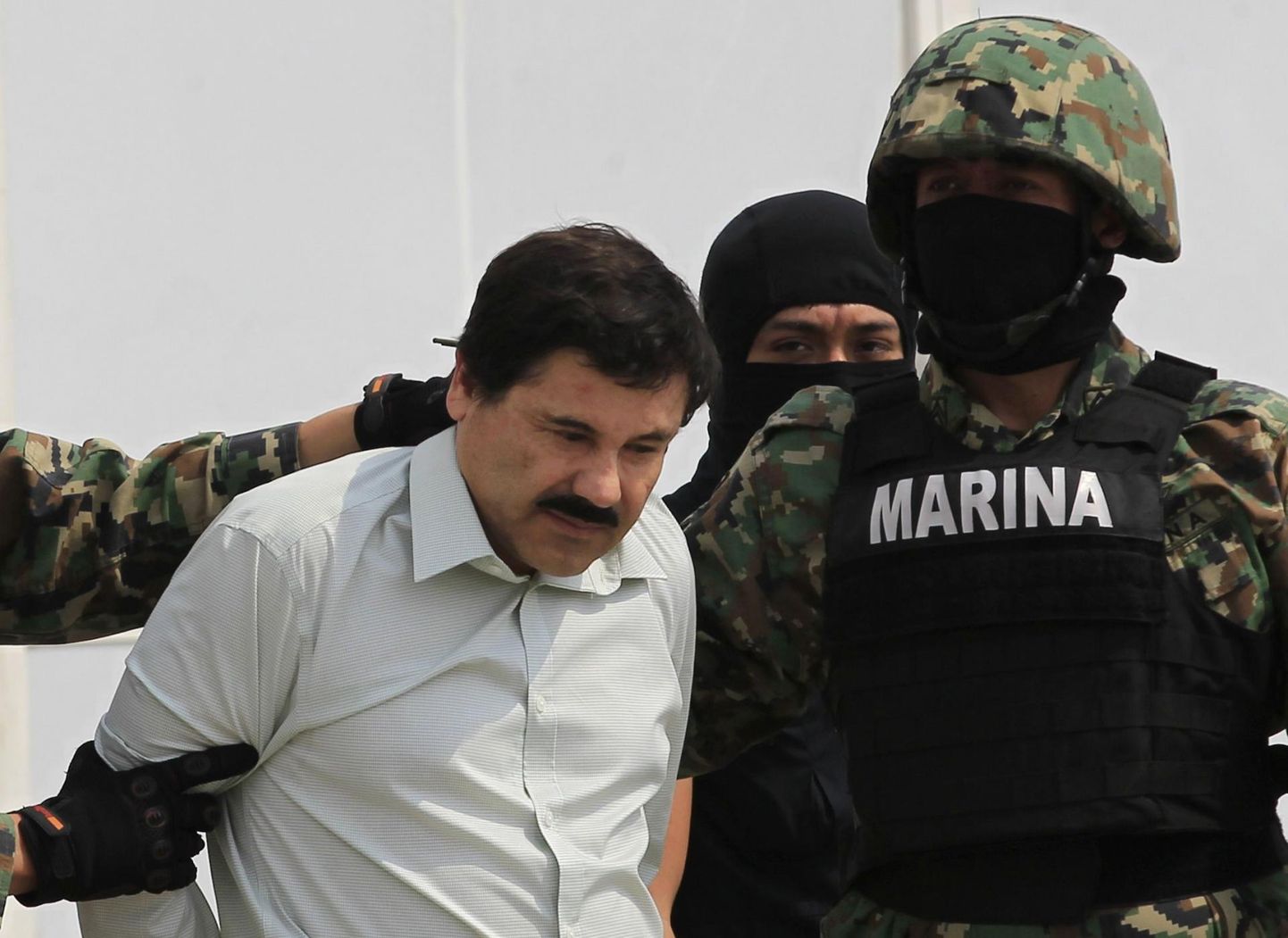 Joaquin Guzmán ehk El Chapo 2014. aastal Mehhiko merejalaväelaste haardes.