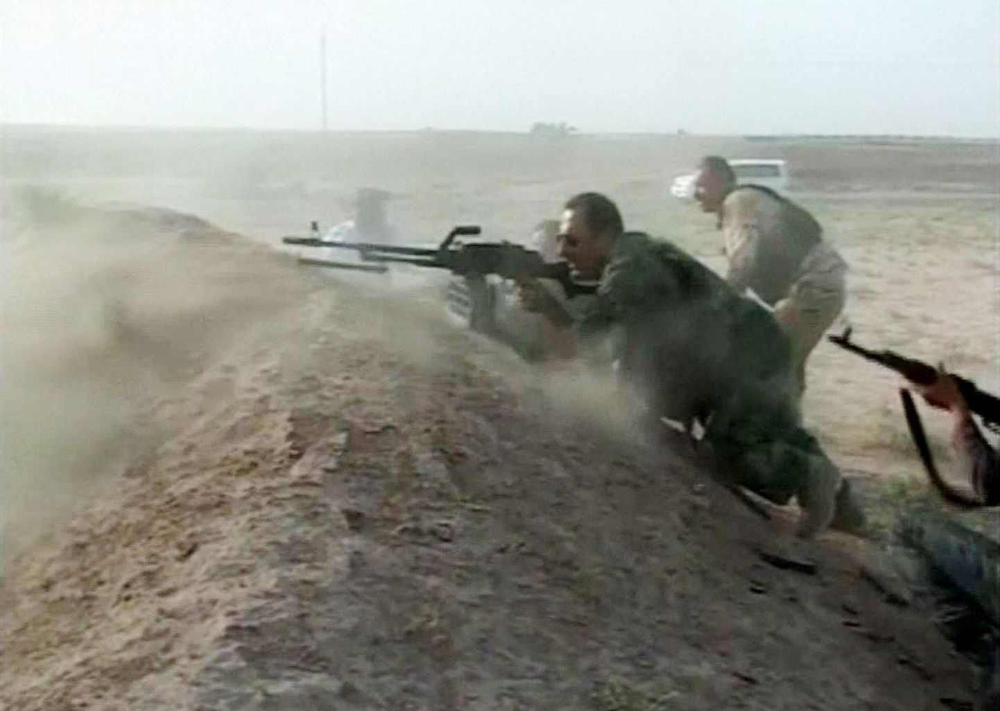 Kurdi võitlejad pidamas lahingut ISIS-e äärmuslastega.