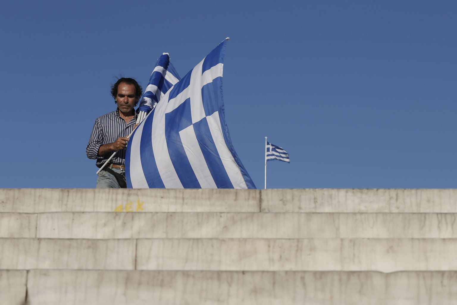 Kreeka mees Kreeka lipuga