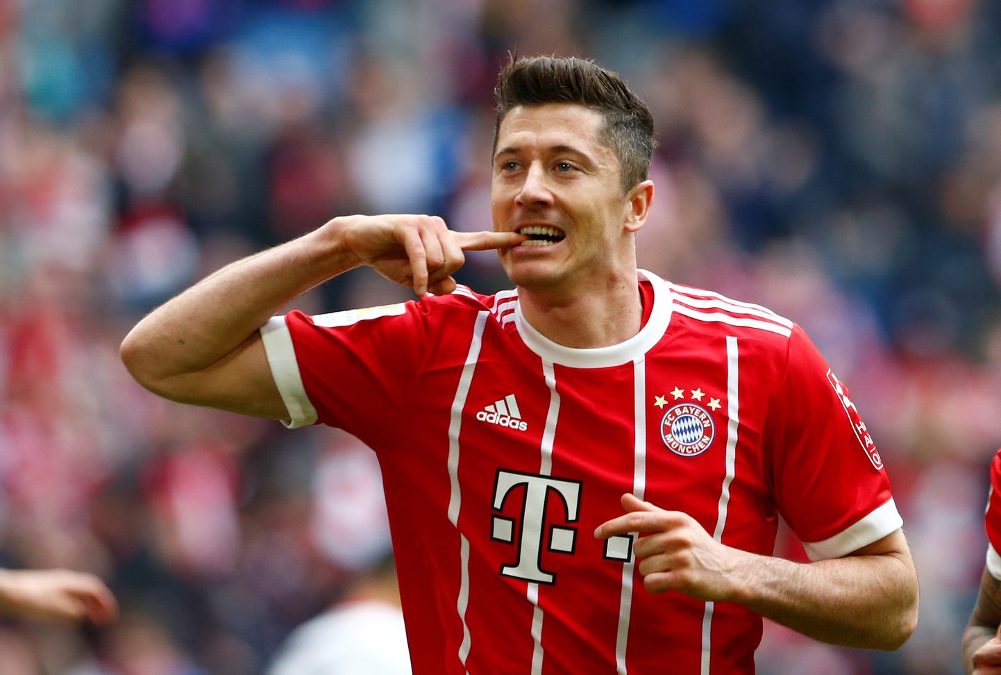 Soccer Football - Bundesliga - Bayern Munich vs Hamburger SV - Allianz Arena, Munich, Germany - March 10, 2018   Bayern Munich's Robert Lewandowski celebrates scoring their third goal     REUTERS/Michaela Rehle    DFL RULES TO LIMIT THE ONLINE USAGE DURING MATCH TIME TO 15 PICTURES PER GAME. IMAGE SEQUENCES TO SIMULATE VIDEO IS NOT ALLOWED AT ANY TIME. FOR FURTHER QUERIES PLEASE CONTACT DFL DIRECTLY AT + 49 69 650050     TPX IMAGES OF THE DAY