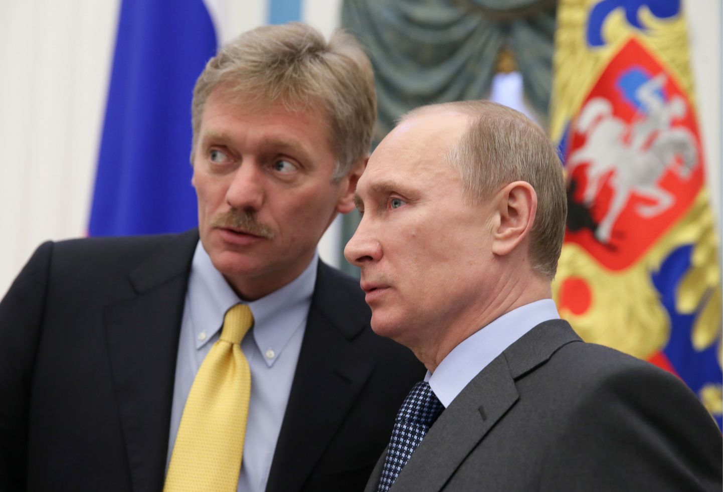 Dmitrijs Peskovs un Vladimirs Putins