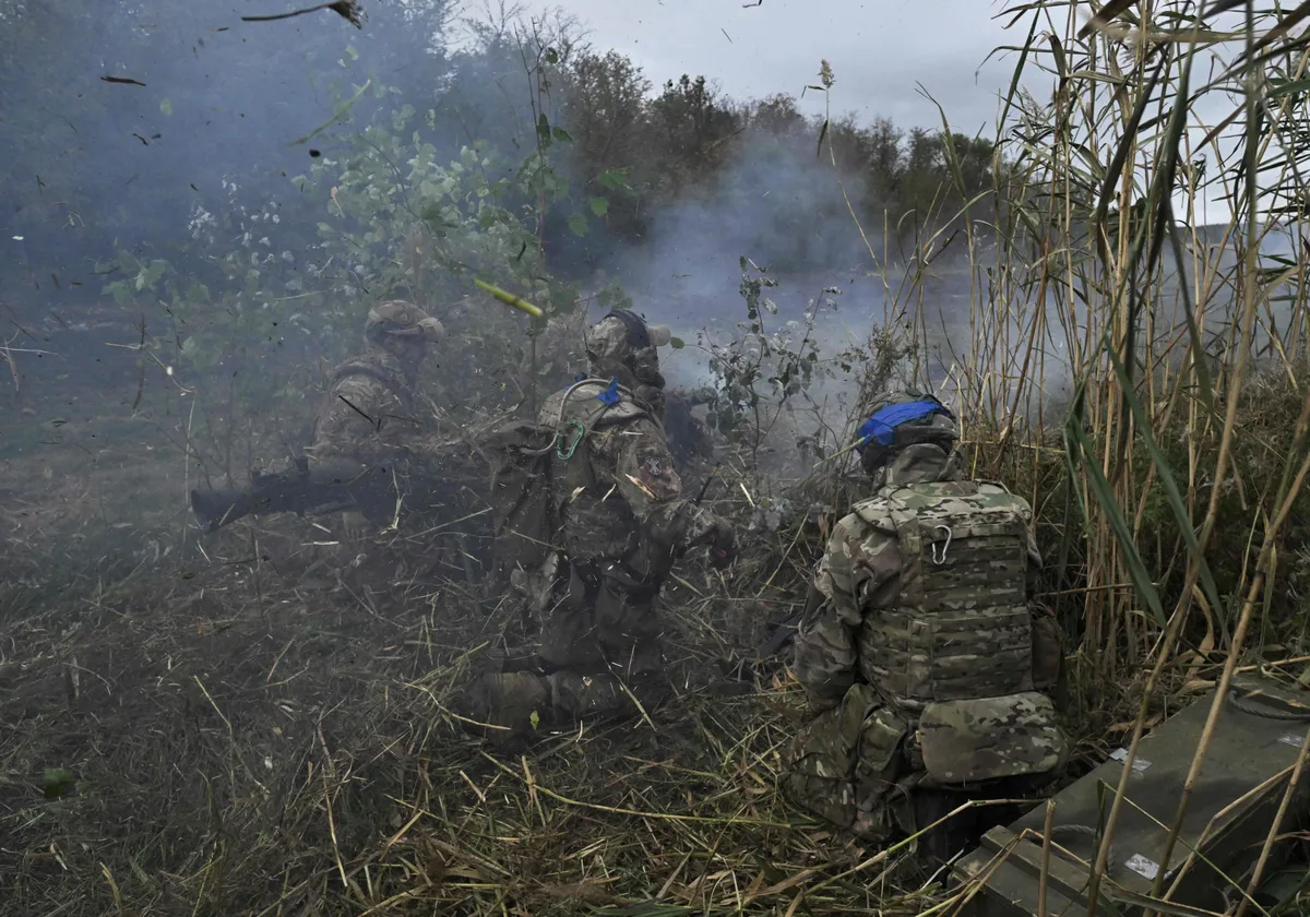 Ukrainian servicemen of the 3rd assault brigade fire a SPG-9 recoilless gun during a tactical training in an undisclosed location in the Donetsk region on October 13, 2023.