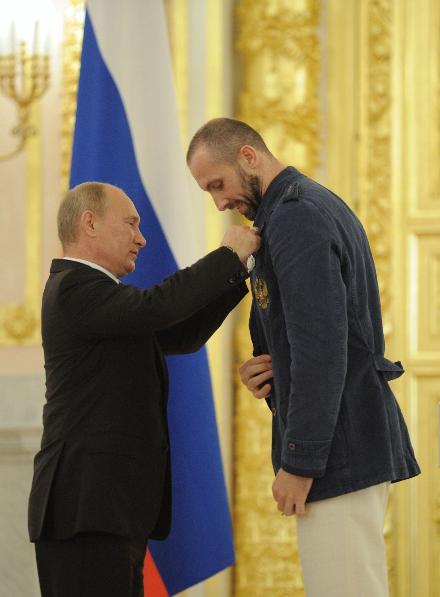 Venemaa prseident Vladimir Putin ja võrkpallikoondise kapten Sergei Tetjuhhin.