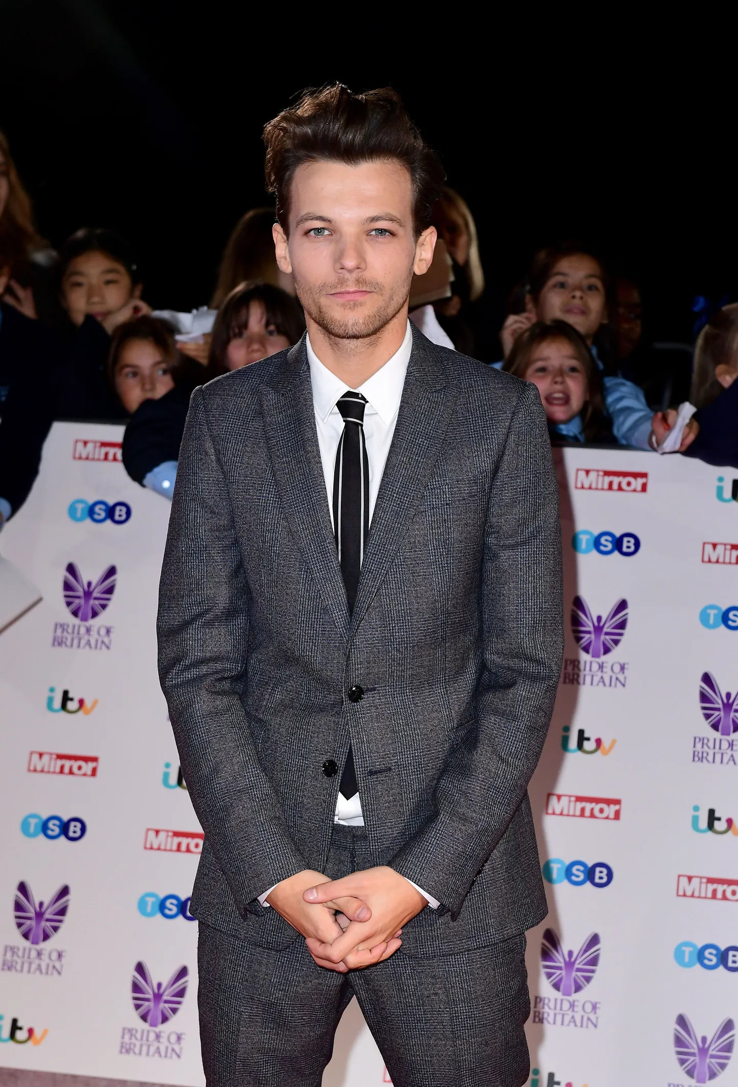 One Directioni staar Louis Tomlinson 2018. aastal.