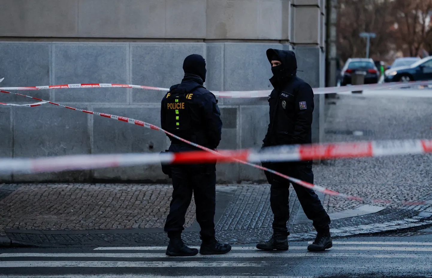 Members of the Police stand guard following a shooting at one of Charles University's buildings in Prague, Czech Republic, December 22, 2023. REUTERS/David W Cerny
