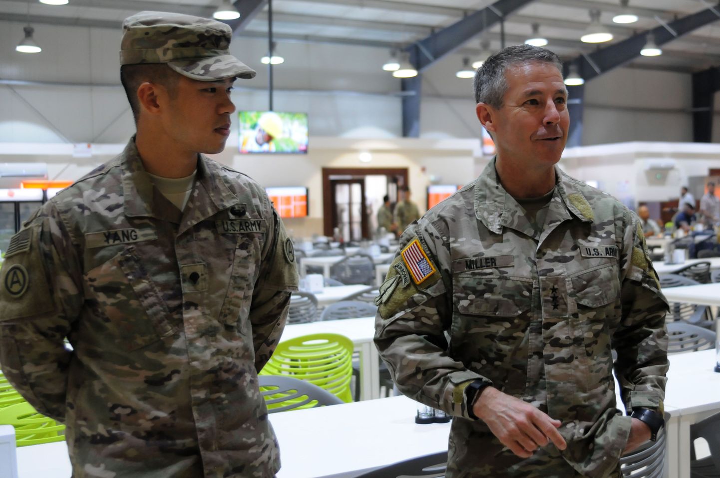 This US Army file photo obtained May 22, 2018, shows Lt. Gen. Scott Miller(R),Commander of the Joint Special Operations Command as he praises Spc.Kevin Yang, of the Massachusetts National Guard's 151st Regional Support Group  deployed to Kuwait in support of US Army Central on April 5, 2018. 
Lieutenant General Scott Miller is set to be nominated to be the next head of US and NATO forces in Afghanistan, a military official told AFP on May 22, 2018. If confirmed by the Senate, Miller would take over from General John Nicholson, who is rotating out of his post after a two-year deployment. / AFP PHOTO / US ARMY / Whitney HUGHES / RESTRICTED TO EDITORIAL USE - MANDATORY CREDIT "AFP PHOTO / US ARMY/WHITNEY HUGHES" - NO MARKETING NO ADVERTISING CAMPAIGNS - DISTRIBUTED AS A SERVICE TO CLIENTS