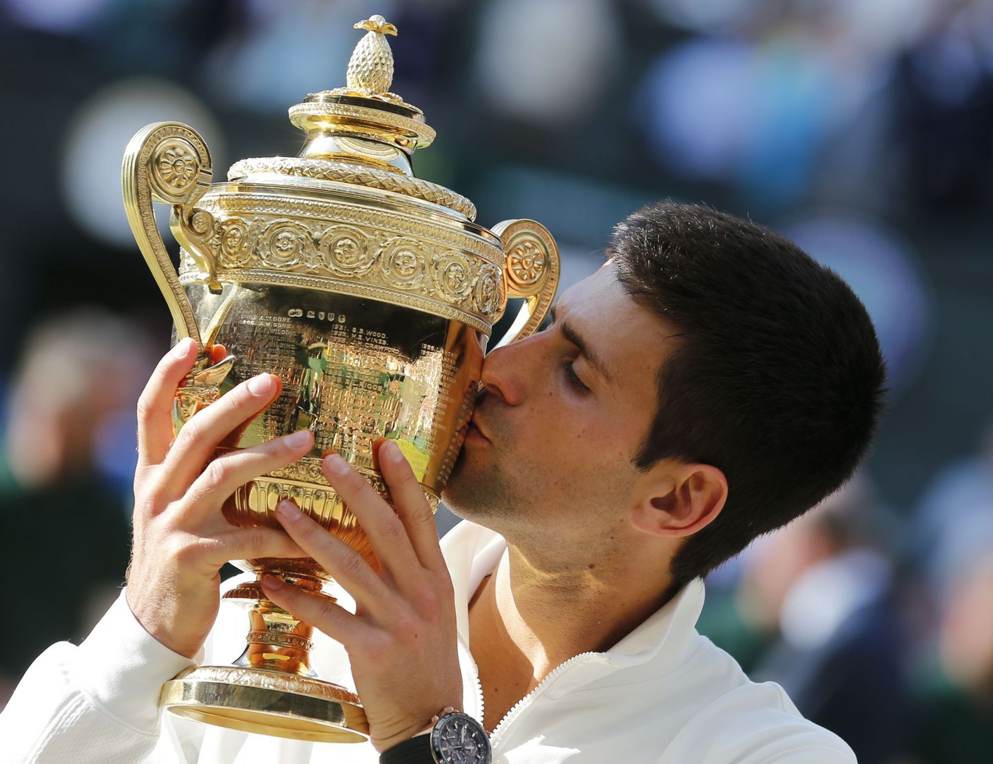 Novak Djokovic 2014. aastal tähistamas Wimbledoni tenniseturniiri võitmist.