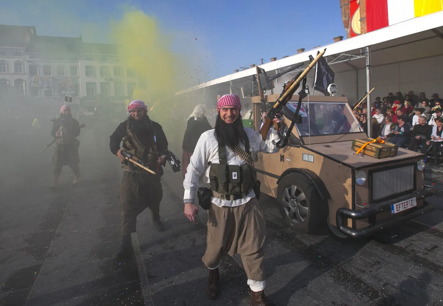 Revellers dressed as Islamic State militants take part in the 87th carnival parade of Aalst February 15, 2015. The Aalst Carnival, which is inscribed on the Representative List of the Intangible Cultural Heritage of Humanity, often shows informal groups presenting mocking interpretations of local and world events of the past year. REUTERS/Yves Herman (BELGIUM - Tags: SOCIETY)