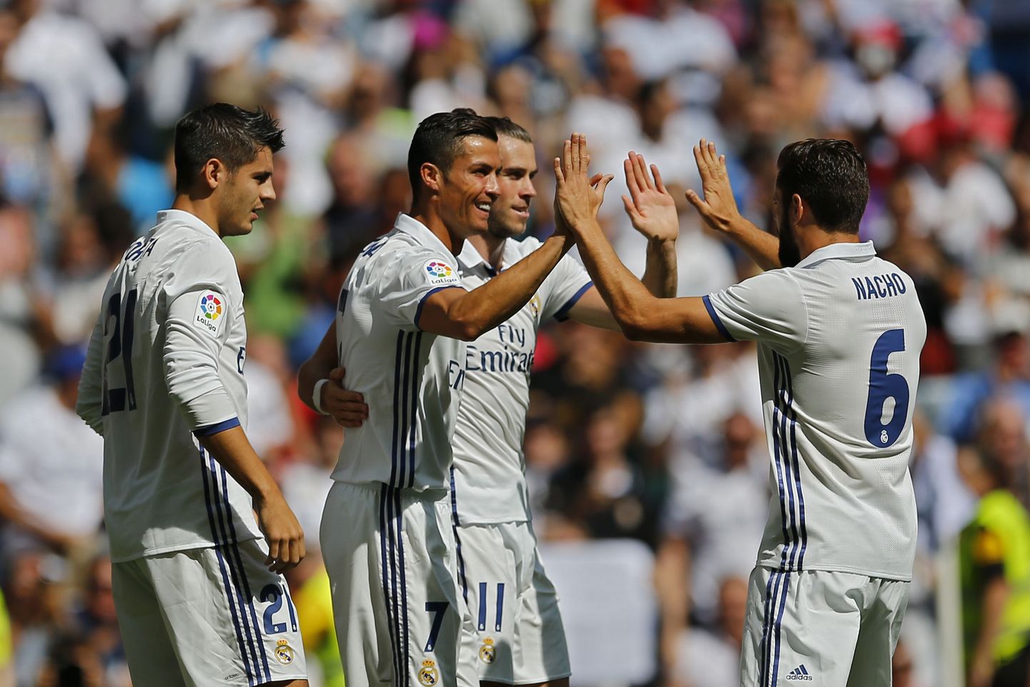Madridi Reali mängijad tähistamas.