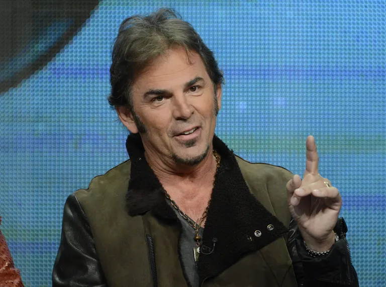 Jonathan Cain asus kaitsma bändi rahavoogu ning sai kohtust lahenduse, mis teda rahuldas.