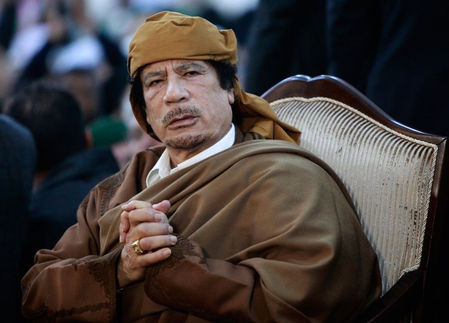 Muam­mar Gaddafi