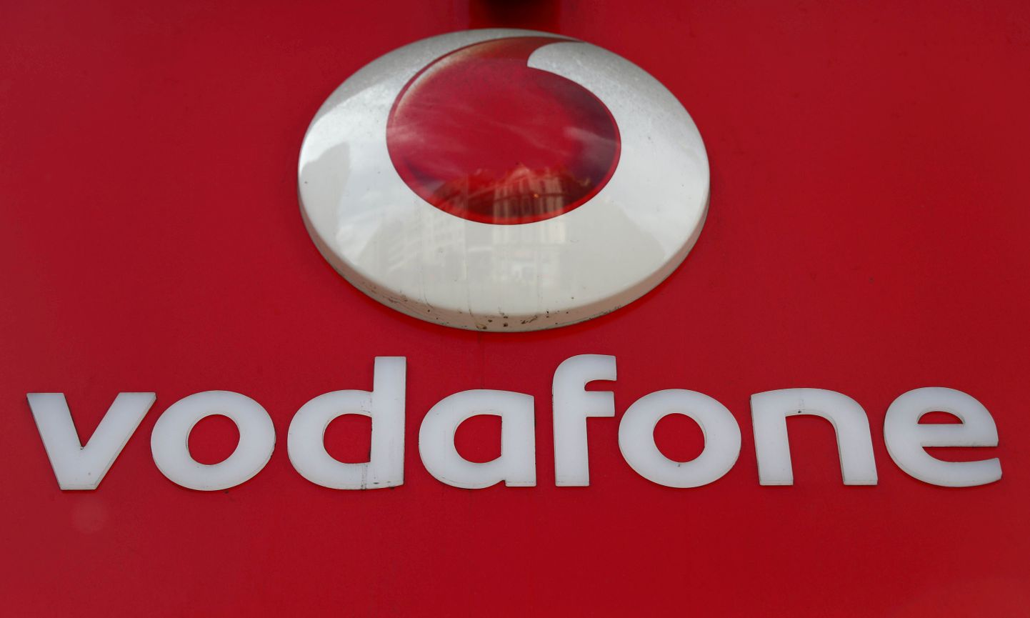 FILE PHOTO: A branded sign is displayed on a Vodafone store in London, Britain May 16, 2017. REUTERS/Neil Hall/File Photo