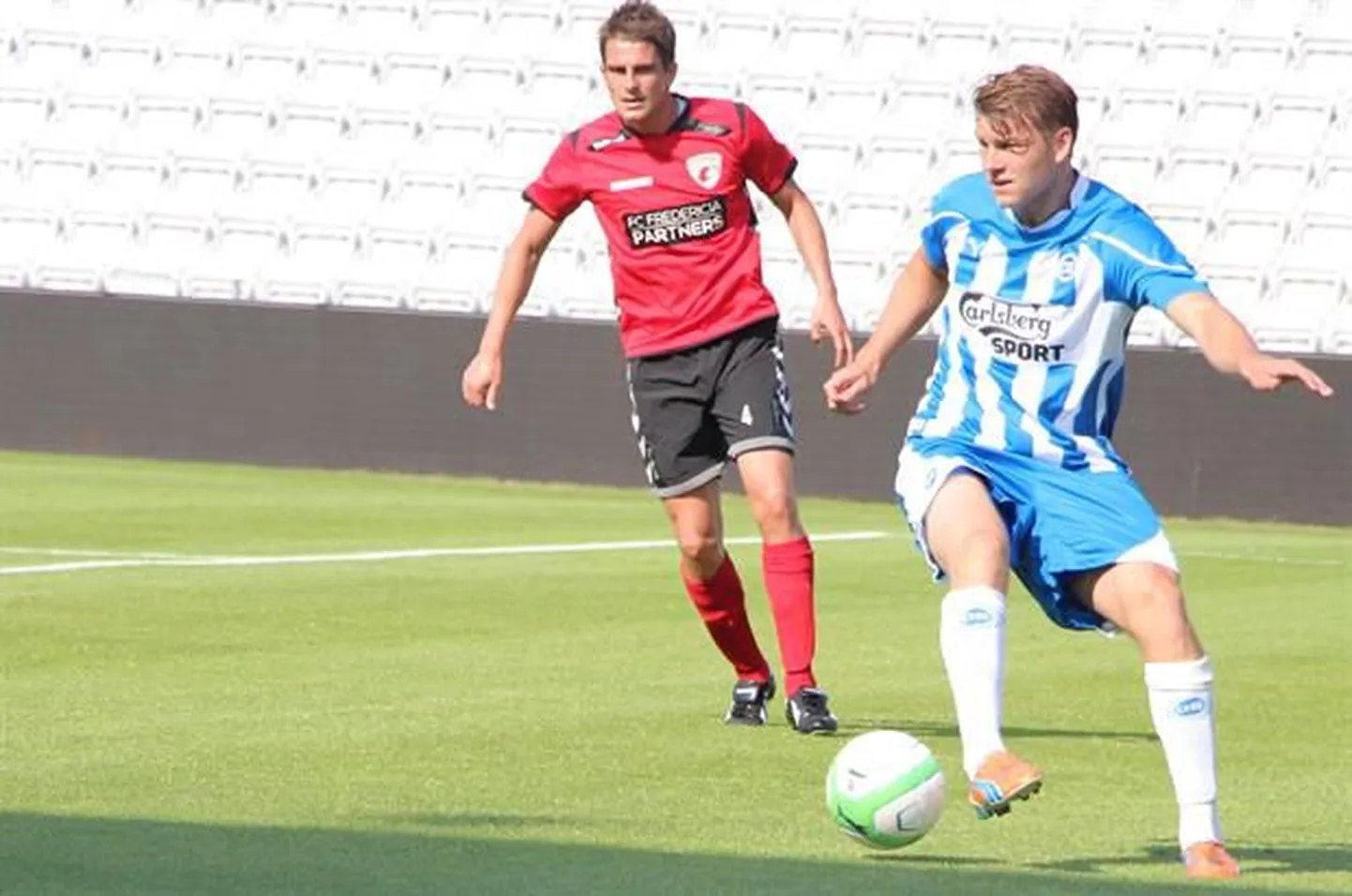 Hannes Anier (paremal) lõpetas Odensega lepingu
