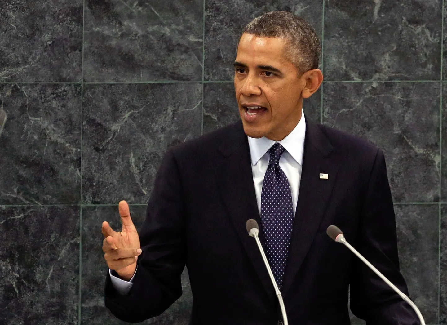 Барак Обама произносит речь с трибуны ООН.