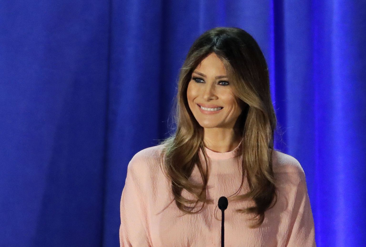 FILE - In this Nov. 3, 2016 file photo, Melania Trump, wife of Republican presidential candidate Donald Trump, speaks in Berwyn, Pa. Documents obtained by The Associated Press from 20 years ago show that Melania Trump was paid for 10 modeling jobs in the United States worth $20,056 before she had legal permission to work in the country. The documents provide the most detailed accounting yet of Mrs. Trump's first months in the U.S.(AP Photo/Patrick Semansky, File)