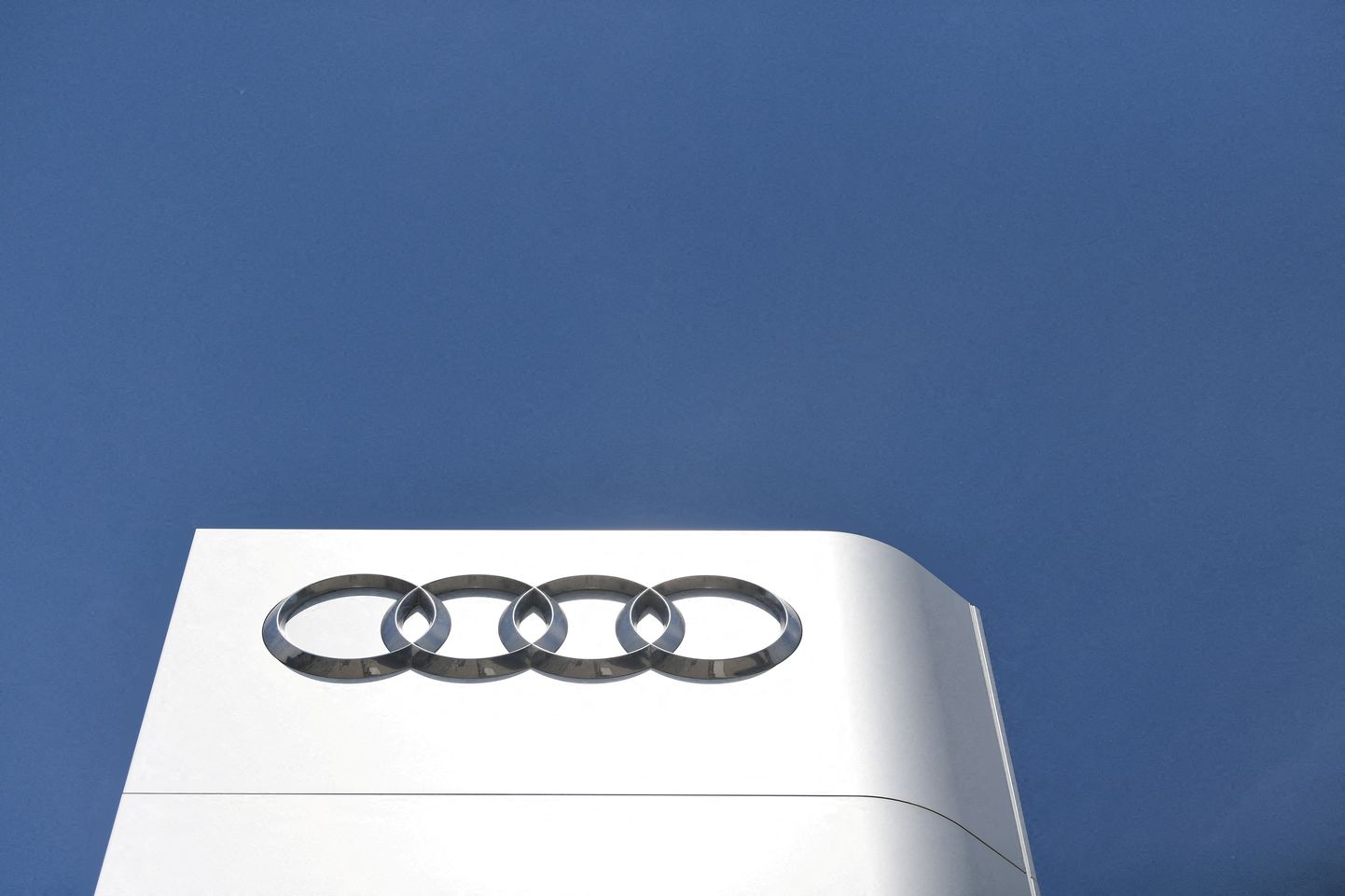 FILE PHOTO: The company logo is seen at the headquarters of the German car manufacturer Audi in Ingolstadt, Germany, June 3, 2020. REUTERS/Andreas Gebert/File Photo