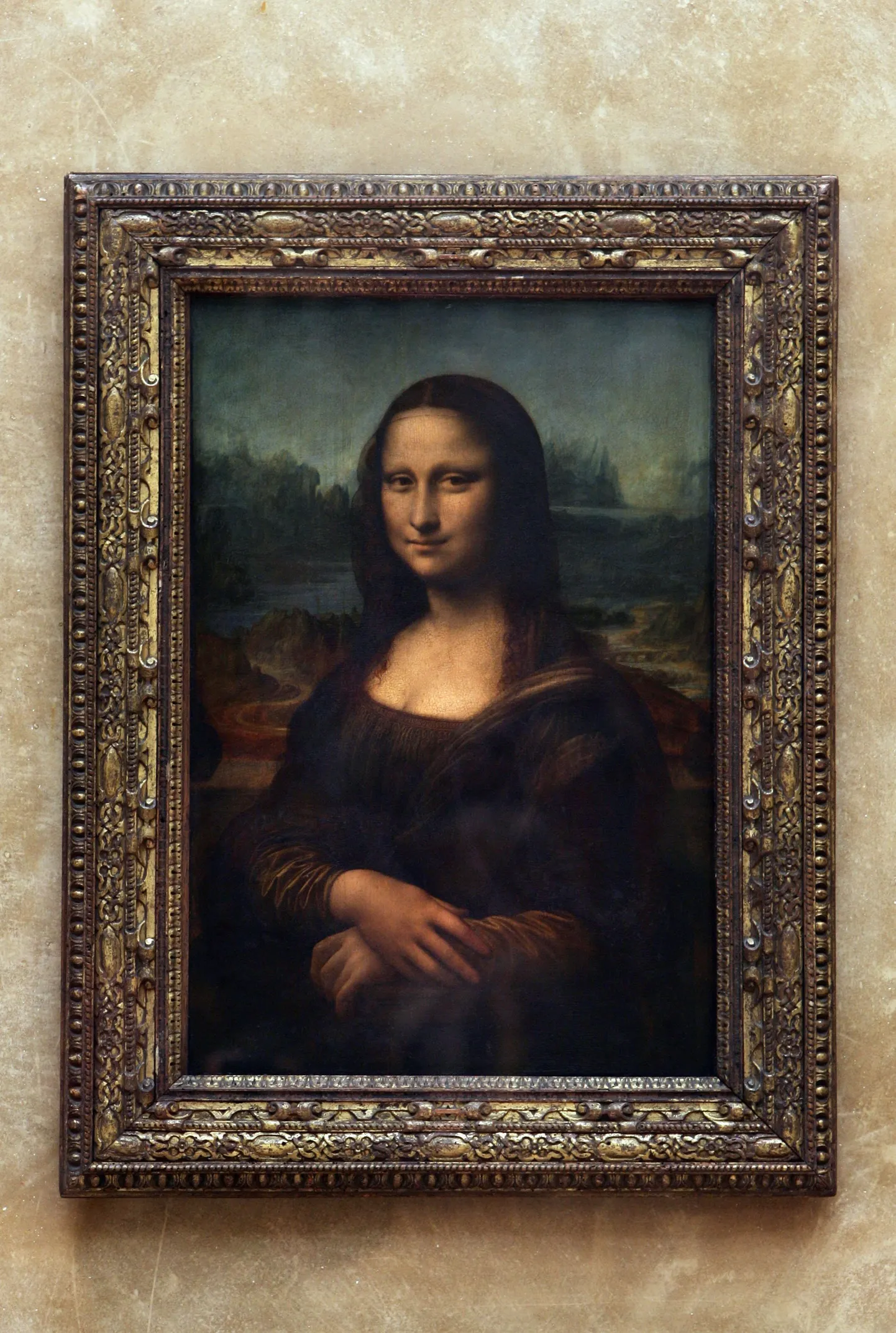 Картина "Мона Лиза" в Лувре.
