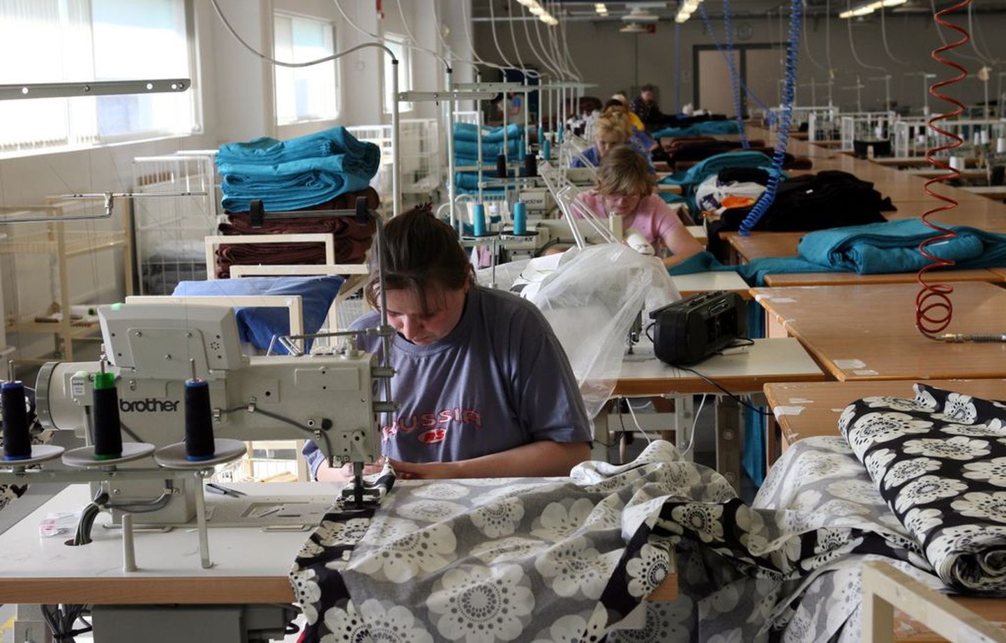 Pildil on töötajad Kreenholmi vabrikus..