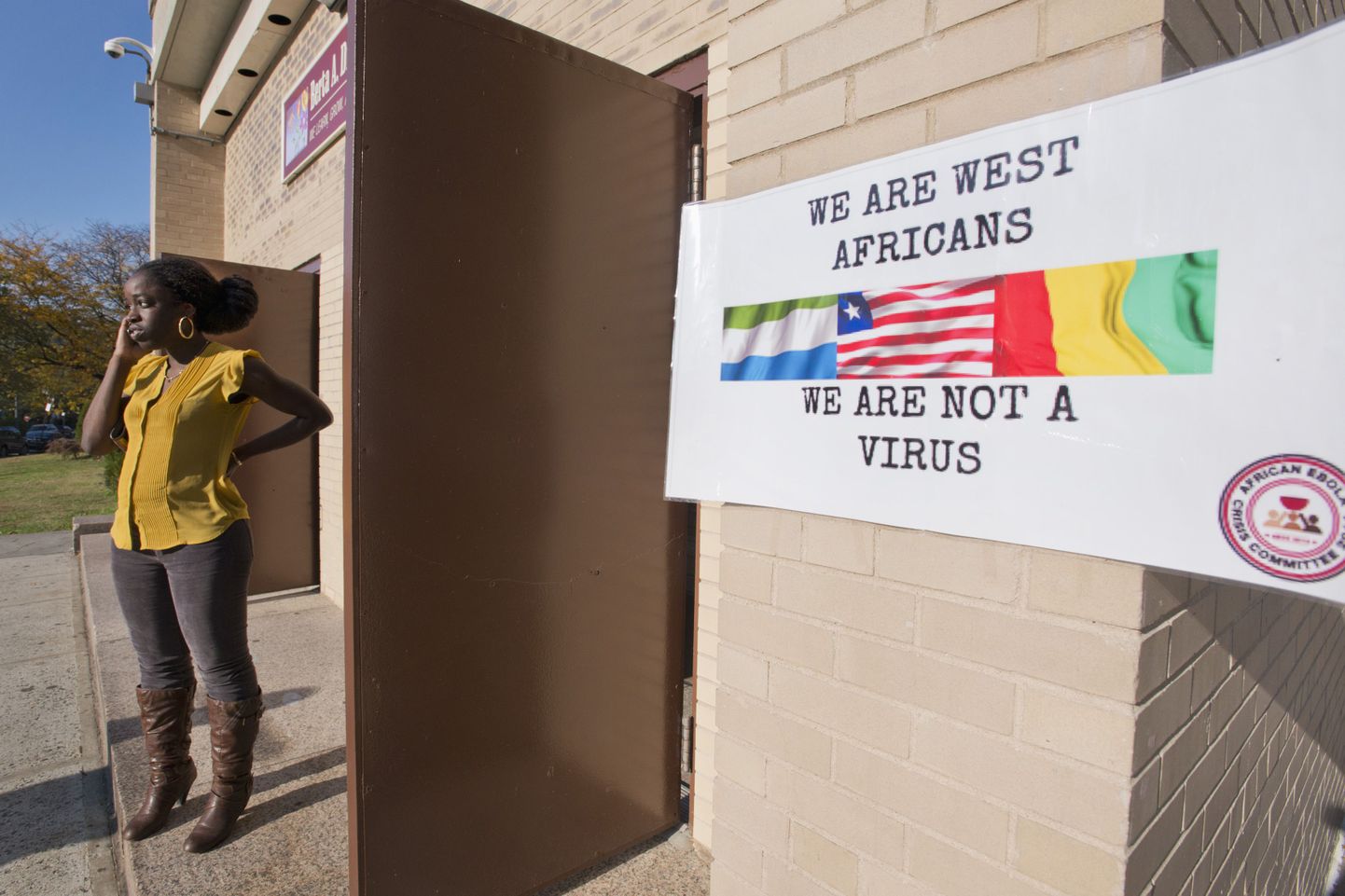 New Yorgis toimuval nõupidamisel meenutab plakat, et lääneaafriklased on siiski ka midagi muud, kui viirus.