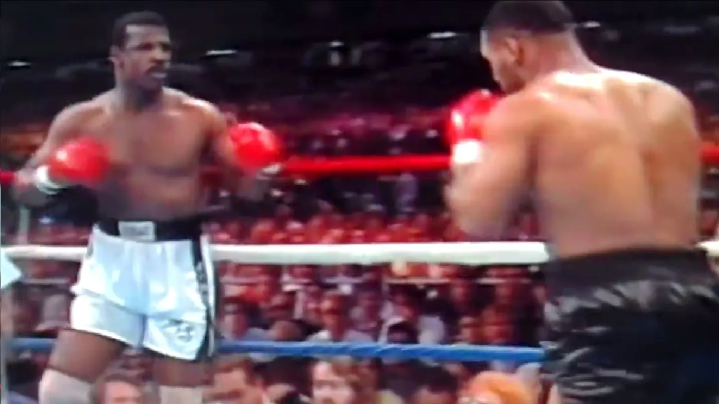 Michael Spinks (vasakul) ja Mike Tyson 1988. aasta raskekaalu tiitlimatšis.