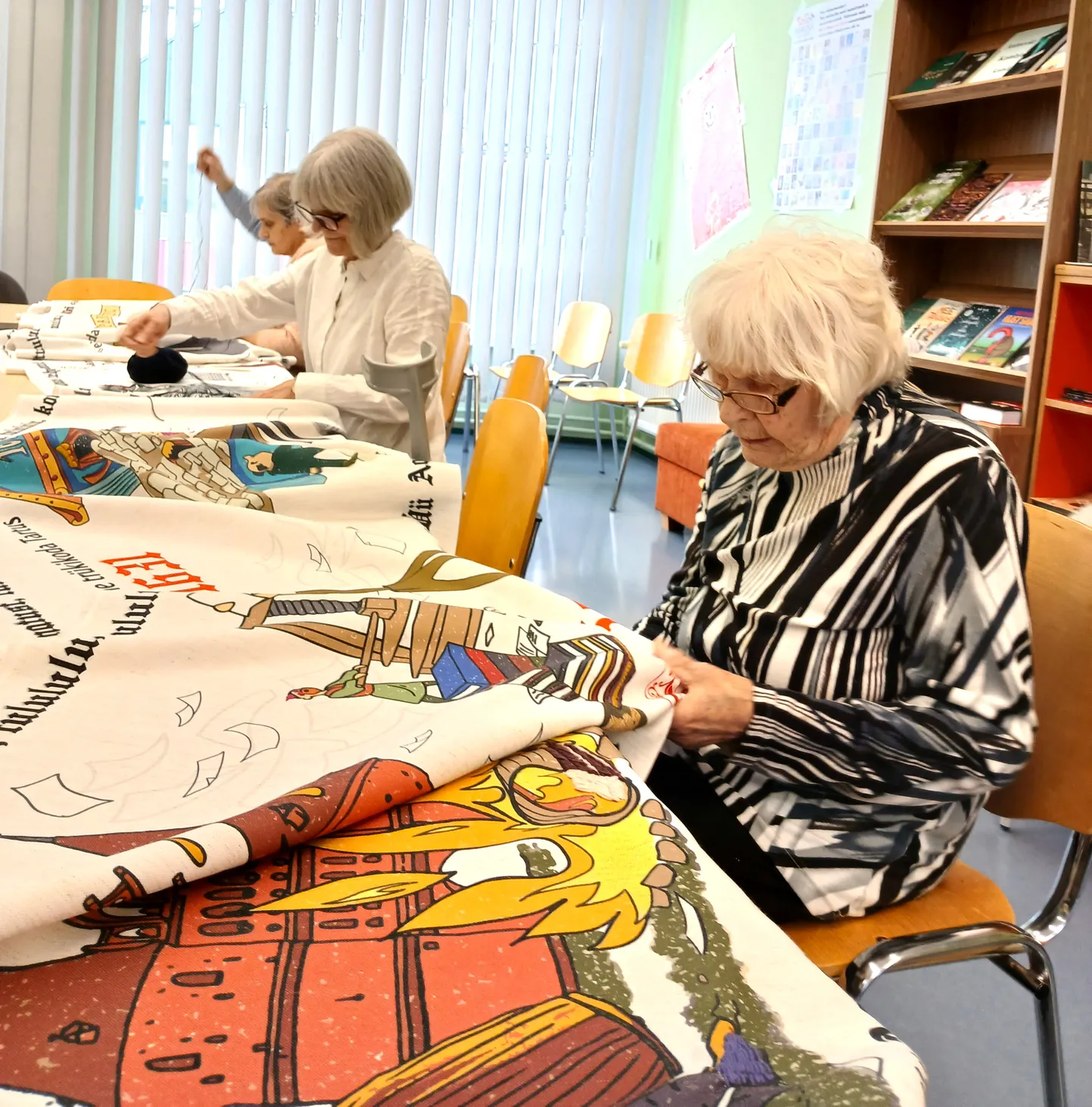 105-aastane Endla Langel (esiplaanil) tikkis eesti raamatu aasta vaibale oma pisted ja ütles 
pärast, et see oli põnev, aga natuke isegi raskevõitu töö.