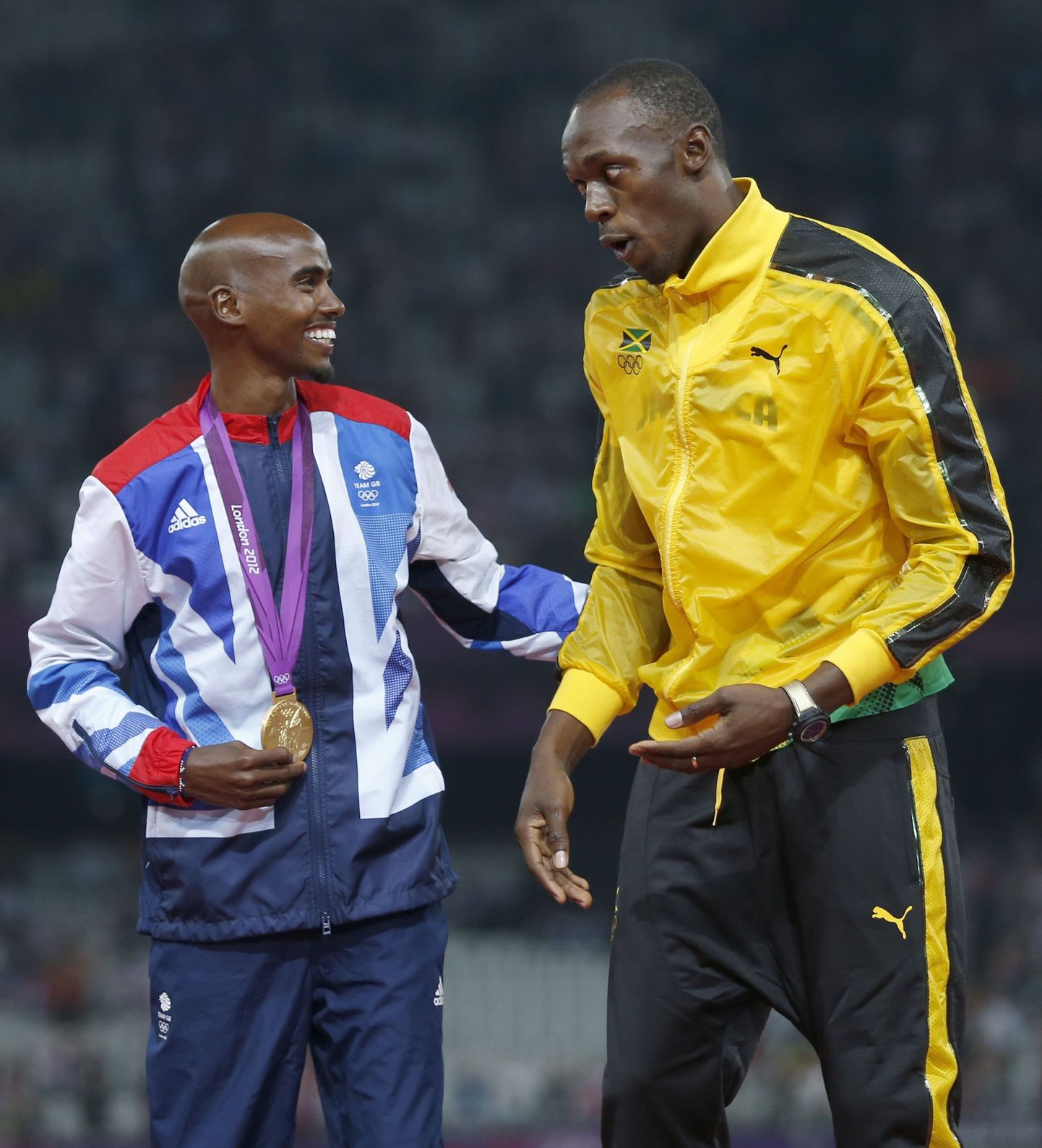Mo Farah (vasakul) koos Jamaica superstaari Usain Boltiga.