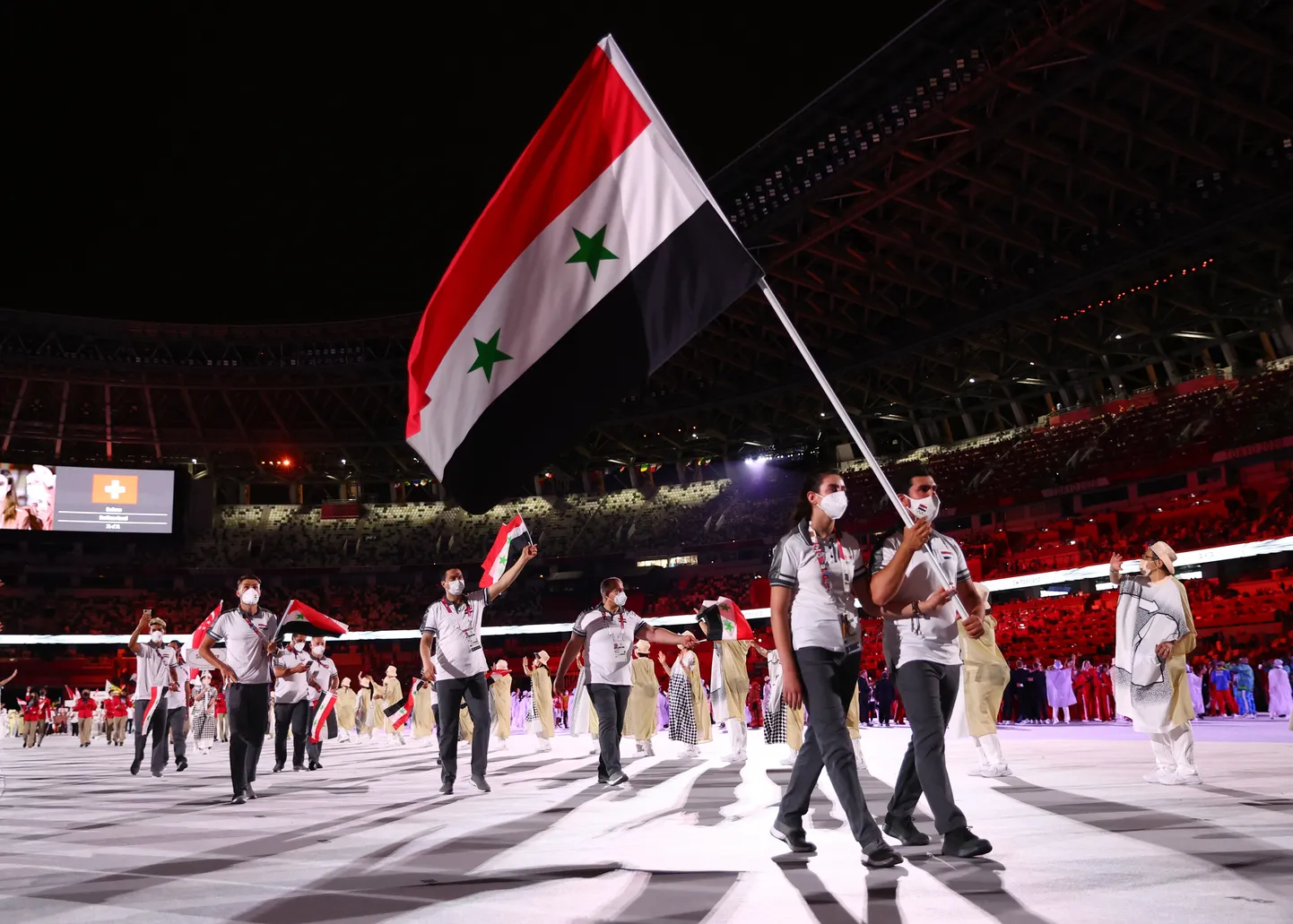 Флаг Сирии, Олимпийские игры в Токио, иллюстративное фото.