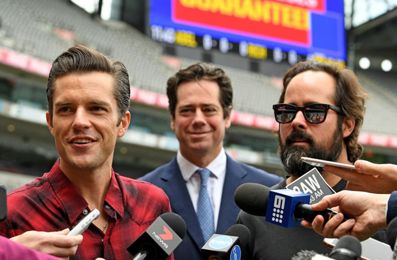 Brendons Flauerss un Ronijs Vanuči (The Killers) Austrālijā