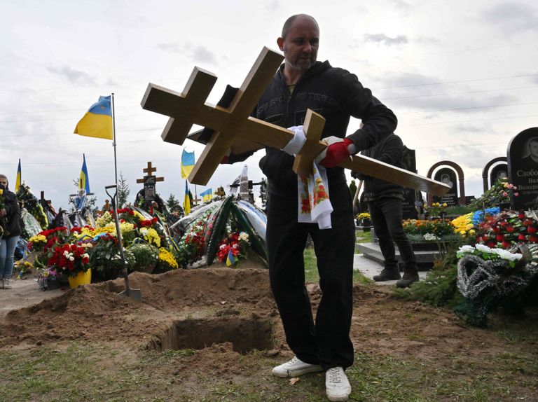 Похороны в Буче, Украина, 3 октября 2022 года.
