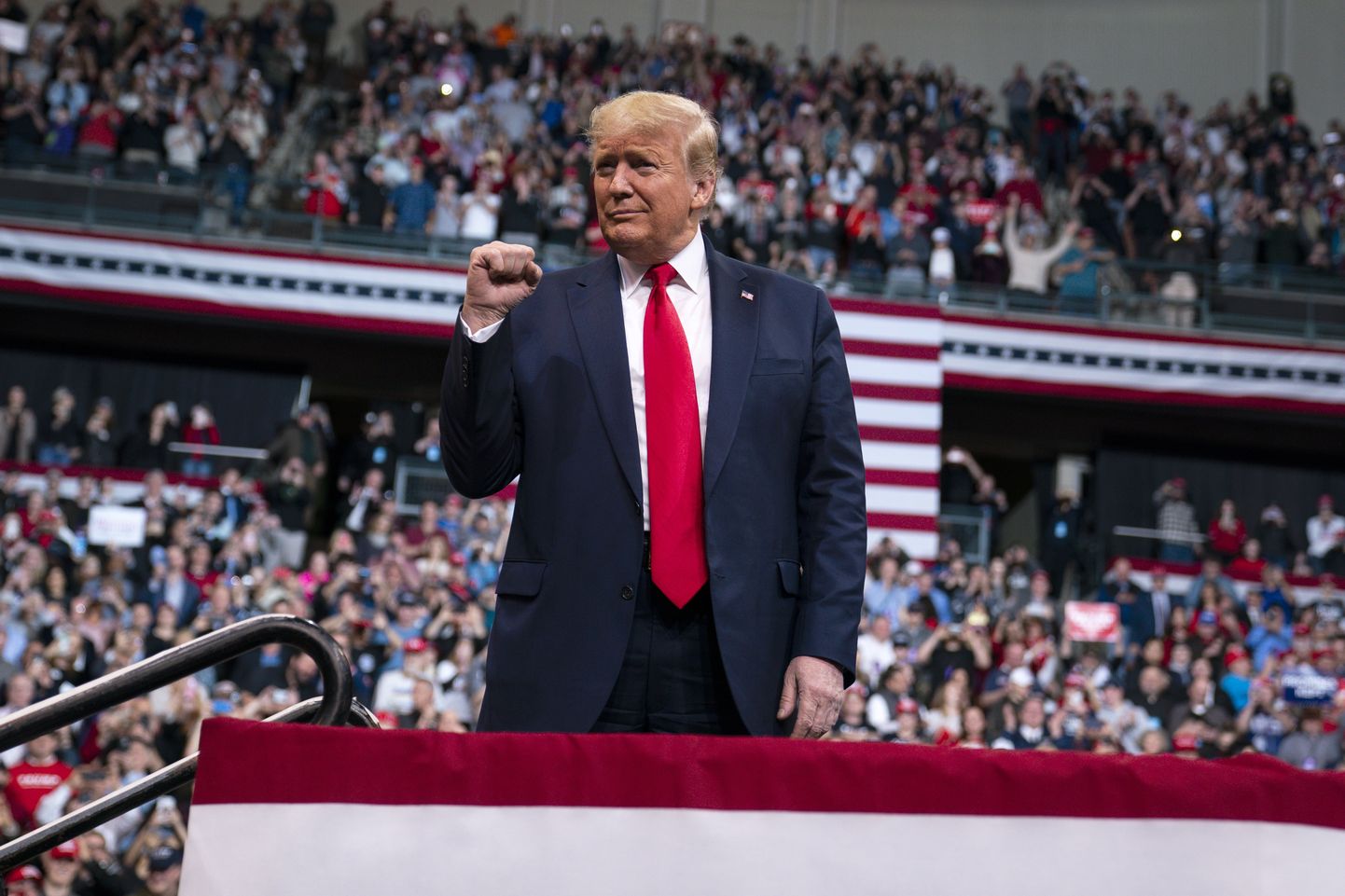 President Donald Trump arrives at SNHU Arena for a campaign rally, Monday, Feb. 10, 2020, in Manchester, N.H. (AP Photo/Evan Vucci)