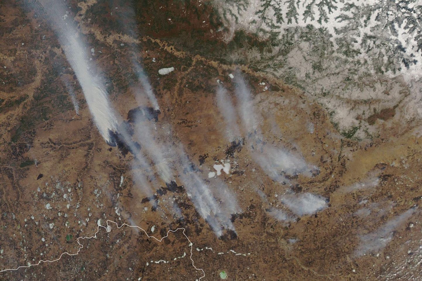 Ida Siberis lõõmavad metsatulekahjud. NASA kosmosefoto.