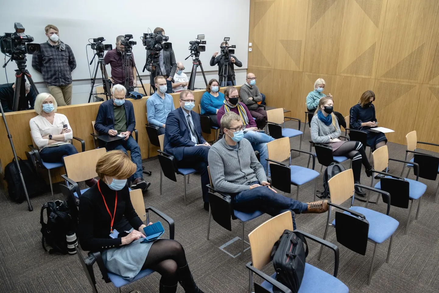 Journalists wearing masks at the COVID-19 press conference on Friday.