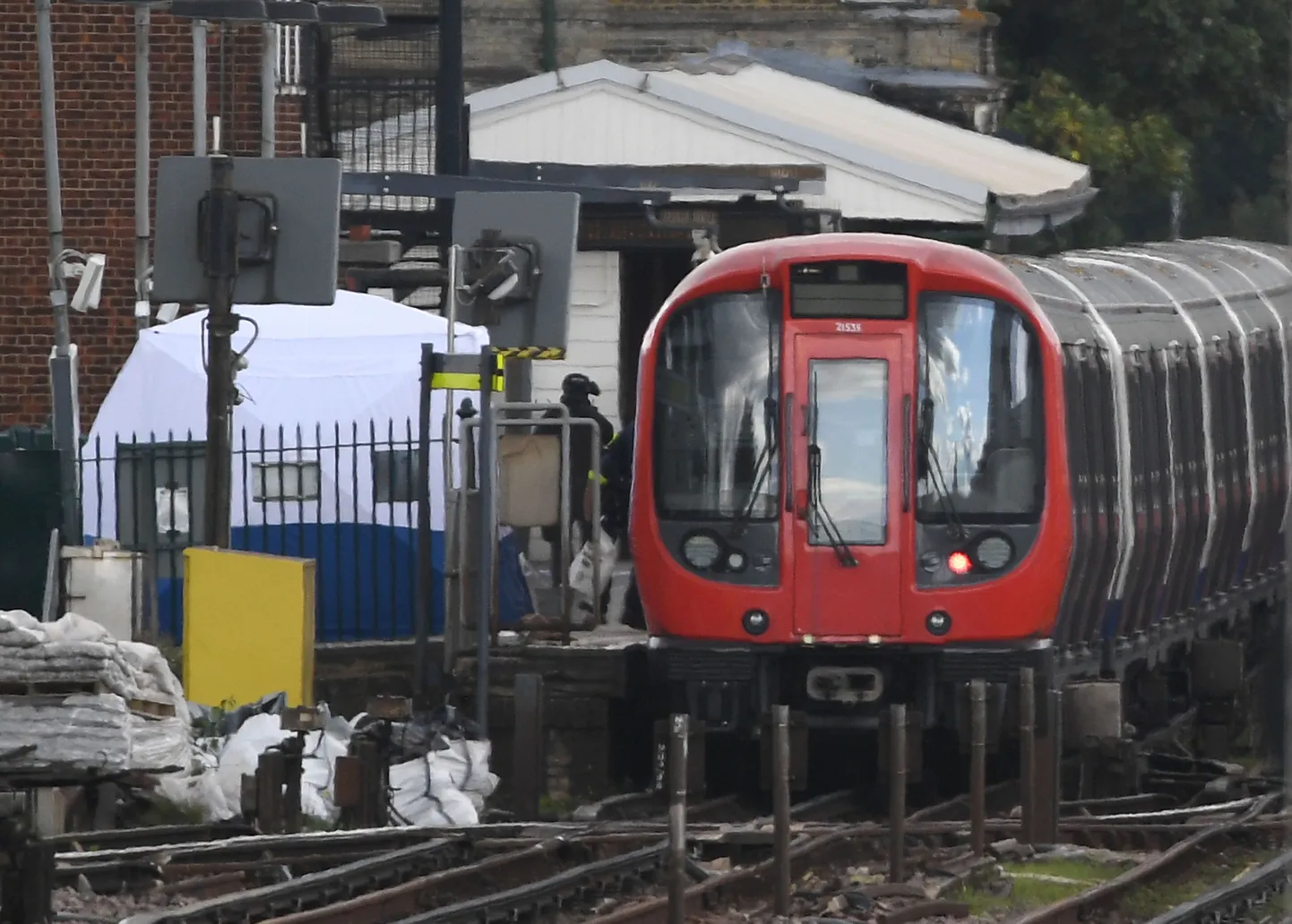 A forensic tent on the platform at Parsons Green station in west London after Scotland Yard declared a terrorist incident following a blast which sent a &quot;fireball&quot; and a &quot;wall of flame&quot; through a packed London Underground train.