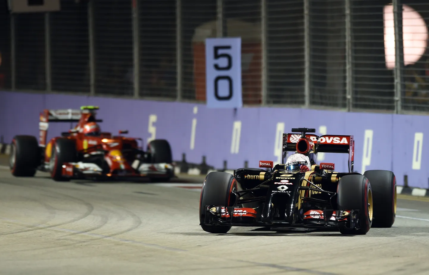 Romain Grosjean (esiplaanil).
