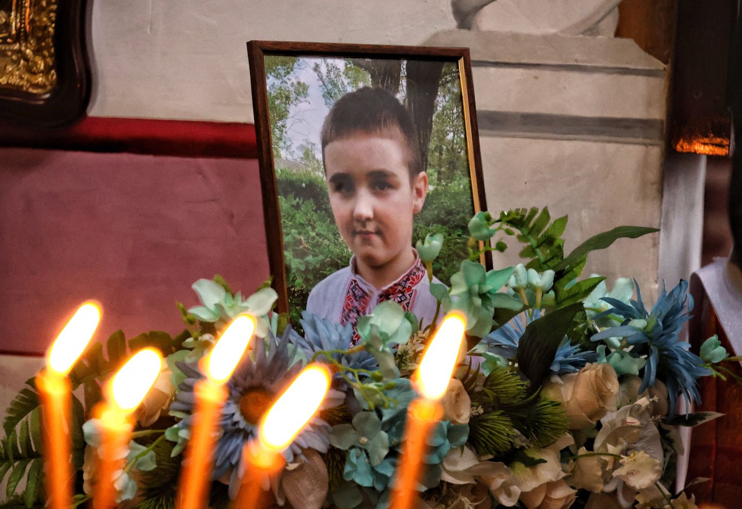 Фотография 9-летнего Сергея, погибшего вместе с 7-месячной Елизаветой и 8-летней Златой в многоквартирном доме в Одессе в результате удара российского беспилотника 2 марта. Похороны детей прошли 5 марта 2024 года.